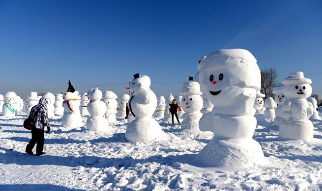 Cute snowmen displayed to greet year 2018 in NE China's Harbin