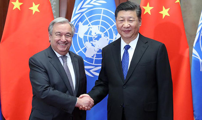 Xi stresses need to improve global governance during meeting with
UN chief