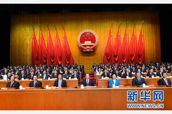 10月1日，慶祝中華人民共和國成立66周年暨新疆維吾爾自治區(qū)成立60周年大會在新疆人民會堂隆重舉行。 新華社記者 饒愛民 攝