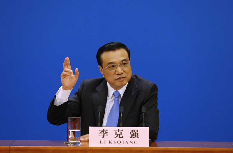 3月15日，國(guó)務(wù)院總理李克強(qiáng)在北京人民大會(huì)堂與中外記者見面，并回答記者提問。 新華社記者 沈伯韓 攝