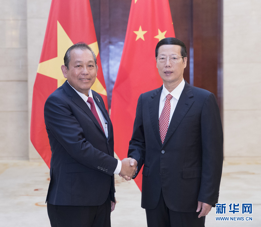  9月11日，中共中央政治局常委、國(guó)務(wù)院副總理張高麗在廣西南寧會(huì)見前來出席第十四屆中國(guó)－東盟博覽會(huì)和中國(guó)－東盟商務(wù)與投資峰會(huì)的越南常務(wù)副總理張和平。新華社記者王曄攝