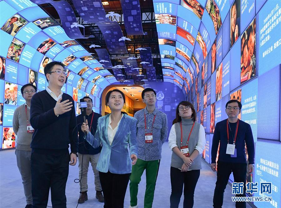 (圖文互動(dòng))(3)筆墨書(shū)崢嶸 光影繪壯美——慶祝改革開(kāi)放40周年大型展覽新華社展項(xiàng)掃描