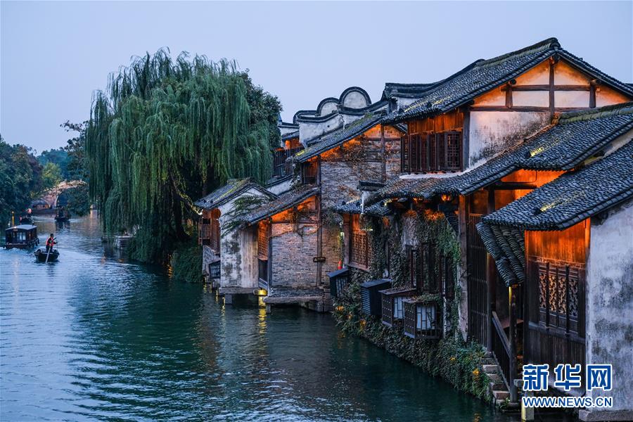 （慶祝改革開放40周年基層行&middot;鄉(xiāng)鎮(zhèn)篇&middot;圖文互動）（1）烏鎮(zhèn)40年：根里的靜與脈中的動