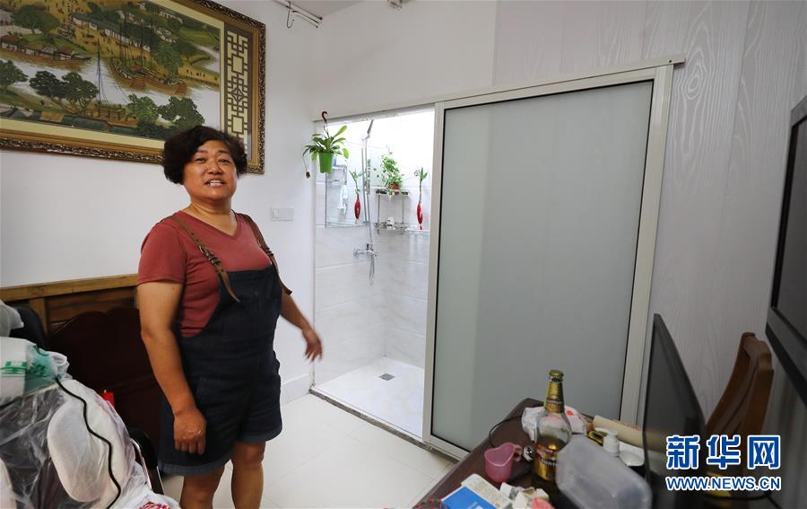 (新華全媒頭條·圖文互動)(8)上海:“三只桶”里看變化