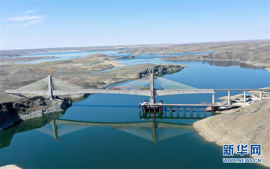 (經(jīng)濟)(1)阿富準鐵路鋪軌全線貫通 北疆鐵路環(huán)線正式形成