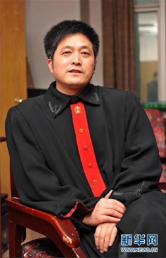 （圖文互動）其人如蘭，既潔且馨&mdash;&mdash;追記&ldquo;全國模范法官&rdquo;胡國運