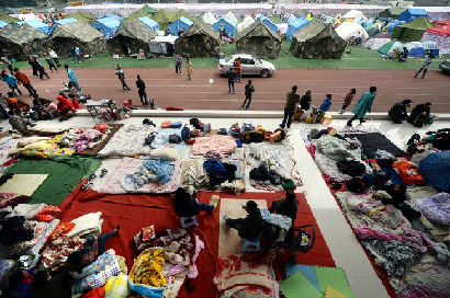 攜手面對(duì)暫時(shí)的困難&mdash;雅安地震部分災(zāi)民安置點(diǎn)實(shí)況