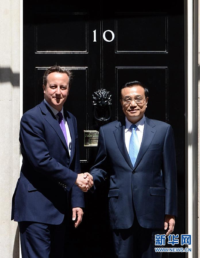 6月17日，國(guó)務(wù)院總理李克強(qiáng)在倫敦唐寧街10號(hào)首相府同英國(guó)首相卡梅倫舉行中英總理年度會(huì)晤。新華社記者 李濤 攝