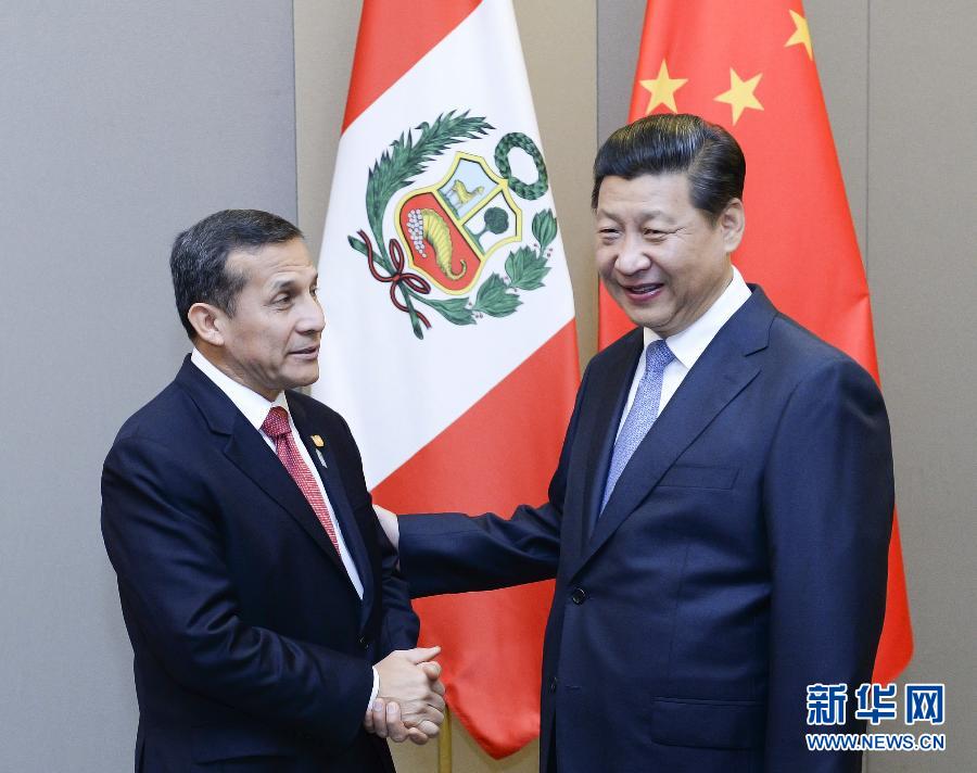 7月16日，國(guó)家主席習(xí)近平在巴西首都巴西利亞會(huì)見秘魯總統(tǒng)烏馬拉。新華社記者 劉建生 攝 