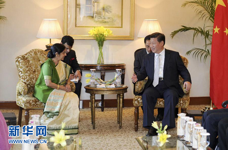 9月18日，國家主席習(xí)近平在新德里會(huì)見印度外長斯瓦拉杰。新華社記者 張鐸 攝
