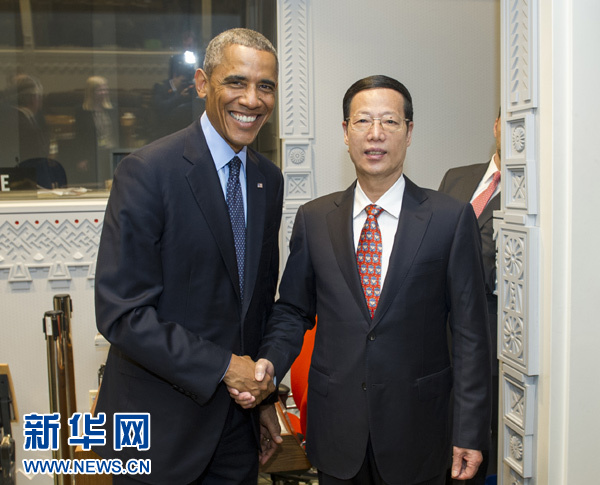9月23日，國家主席習(xí)近平特使、國務(wù)院副總理張高麗在紐約會(huì)見出席聯(lián)合國氣候峰會(huì)的美國總統(tǒng)奧巴馬。 新華社記者王曄攝