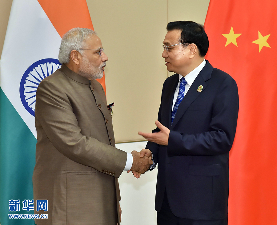 11月13日，中國國務(wù)院總理李克強(qiáng)在緬甸內(nèi)比都會(huì)見印度總理莫迪。 新華社記者 李濤 攝