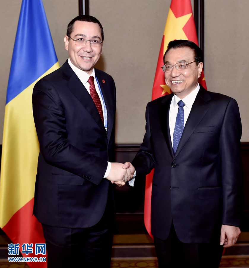 12月16日，中國(guó)國(guó)務(wù)院總理李克強(qiáng)在貝爾格萊德會(huì)見羅馬尼亞總理蓬塔。 新華社記者劉力航攝
