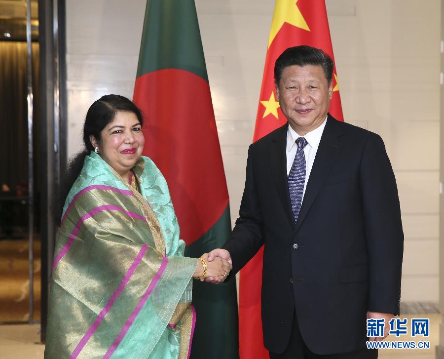 10月14日，國家主席習(xí)近平在達(dá)卡會見孟加拉國國民議會議長喬杜里。 新華社記者蘭紅光攝 