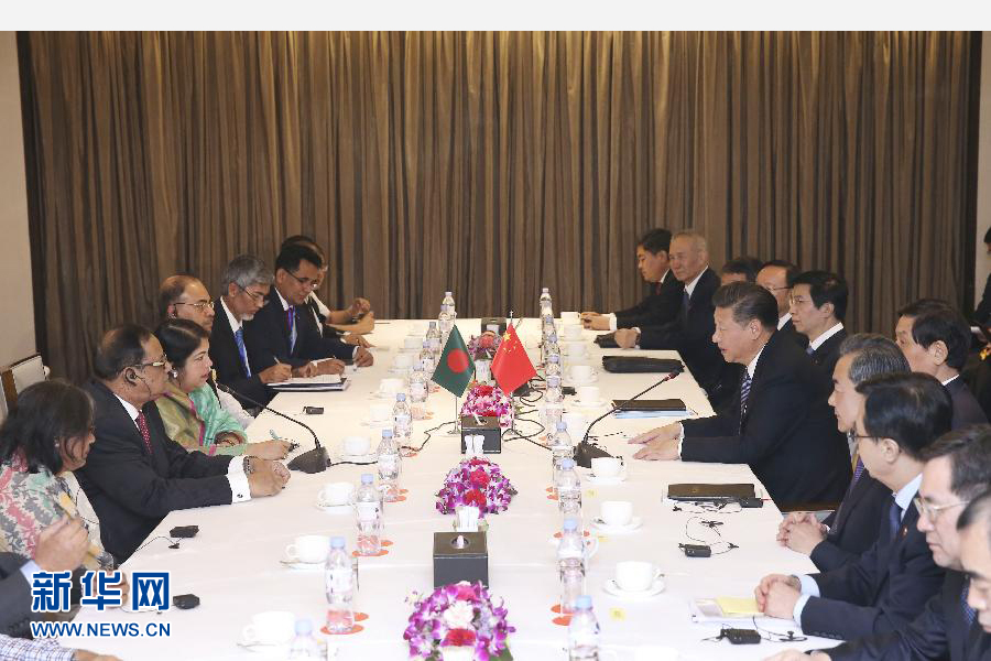 10月14日，國家主席習(xí)近平在達(dá)卡會見孟加拉國國民議會議長喬杜里。 新華社記者龐興雷攝 