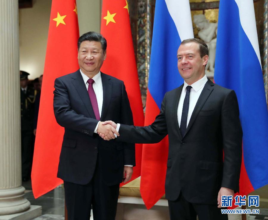 7月4日，國家主席習(xí)近平在莫斯科會見俄羅斯總理梅德韋杰夫。新華社記者 劉衛(wèi)兵 攝