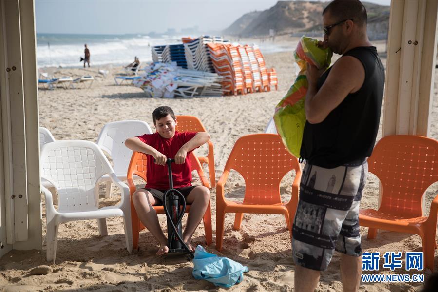 （國際&middot;圖文互動(dòng)）（3）特寫：穿過檢查站去看海