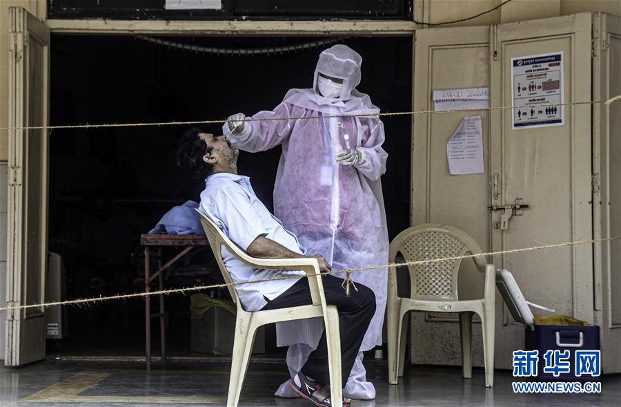 (國(guó)際疫情)(2)印度新冠確診病例超600萬 單日新增有所下降